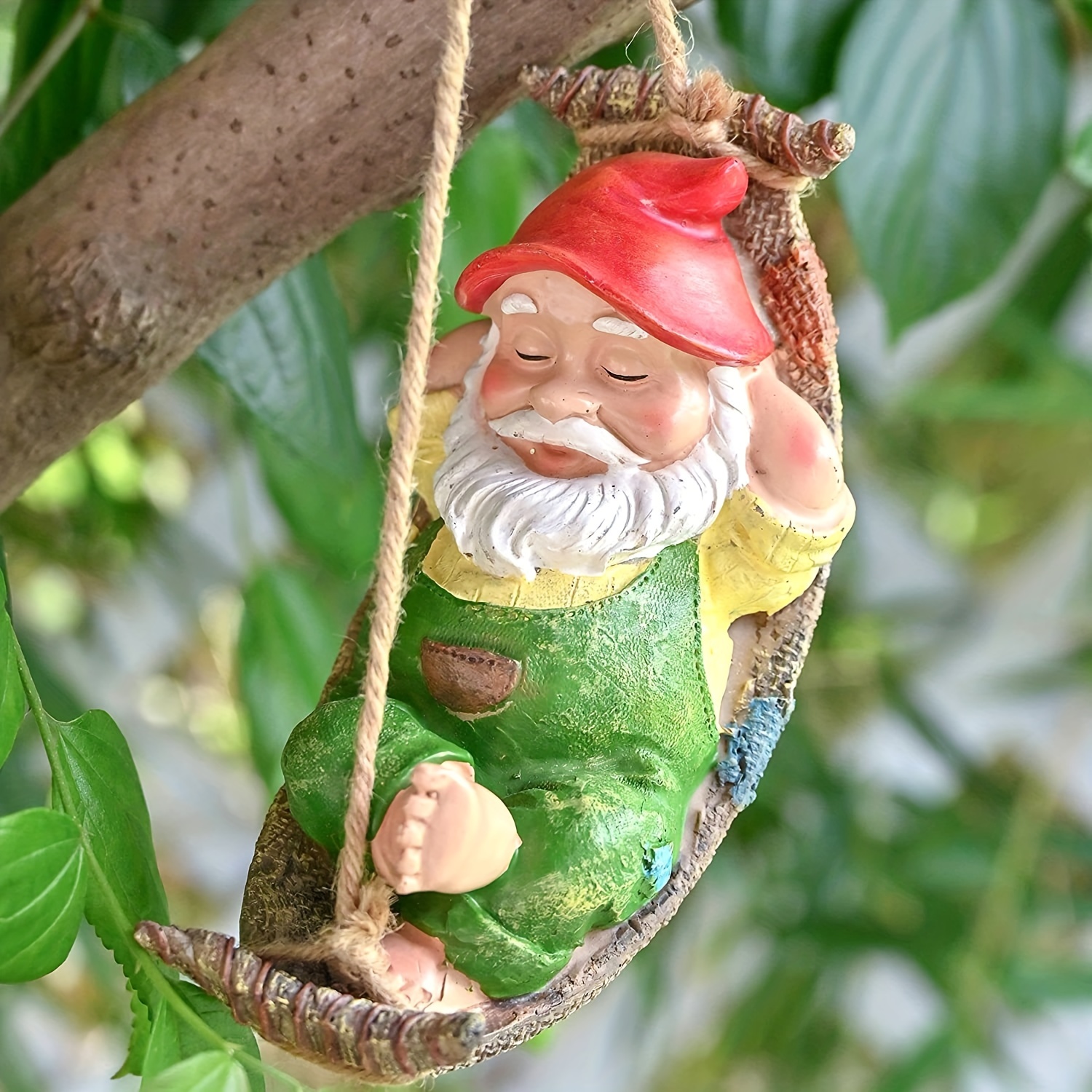 Photograph of a garden gnome chilling in a hammock