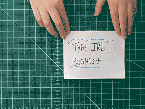 An animation of a book with turning pages.